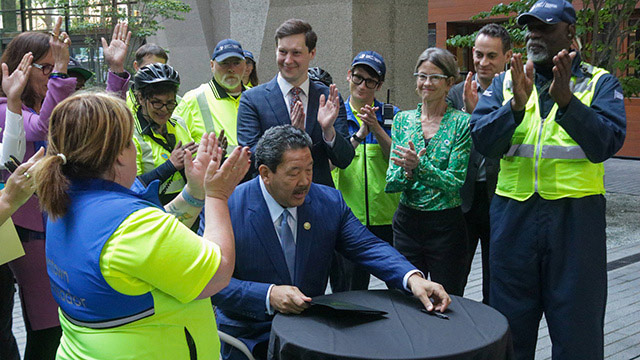 Mayor Metropolitan Improvement District renewal signing 